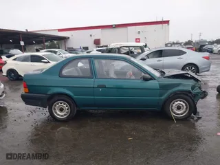 1996 Toyota Tercel DX with VIN JT2AC52L9T0127262, listed as a IAAI auction lot 41504210 with 135,732 mi miles. Bid and sale history available at carsss.com. Image 14.