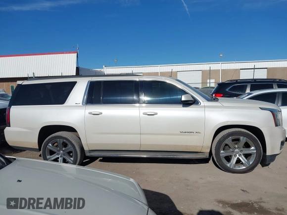 2015 GMC Yukon XL SLT with VIN 1GKS2HKC0FR179223, listed as a IAAI auction lot 40964120 with 184,592 mi miles. Bid and sale history available at carsss.com. Image 13.