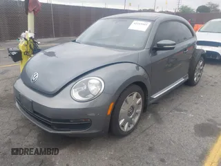2013 Volkswagen Beetle 2.5L with VIN 3VWJP7AT6DM667477, listed as a IAAI auction lot 42215545 with 87,392 mi miles and . Bid and sale history available at DreamBid. Image 17.