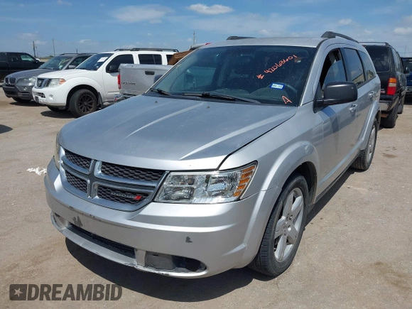 2014 Dodge Journey SE with VIN 3C4PDCAB0ET284437, listed as a IAAI auction lot 42063601 with 206,913 mi miles and . Bid and sale history available at carsss.com. Image 2.