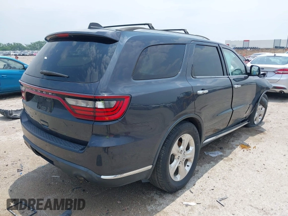 2014 Dodge Durango SXT with VIN 1C4RDHAG3EC560851, listed as a IAAI auction lot 42282572 with Not provided miles and . Bid and sale history available at DreamBid. Image 4.