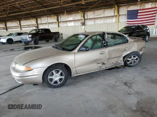 2003 Oldsmobile Alero GL1 с VIN 1G3NL52E23C113888, выставлен на аукционе Copart как лот 58637745 с пробегом 195 591 миль миль и Списание • Salvage title. История ставок и продаж доступна на DreamBid. Изображение 1.