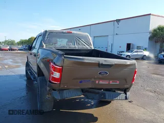 2018 Ford F-150 XL with VIN 1FTEW1EG1JFC31794, listed as a IAAI auction lot 41304111 with 129,058 mi miles and . Bid and sale history available at carsss.com. Image 6.
