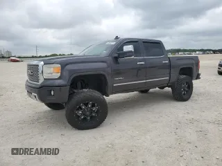 2015 GMC Sierra 1500 Denali z VIN 3GTP1WEC3FG154000, wystawiony jako Copart lot #54964815 z przebiegiem 166 871 mil mil oraz Szkoda całkowita • Salvage title. Historia ofert i sprzedaży dostępna na DreamBid. Obrazek 1.