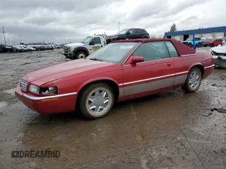 1996 Cadillac Eldorado z VIN 1G6EL12Y5TU617738, wystawiony jako Copart lot #47980975 z przebiegiem 79 692 mil mil oraz Czysty tytuł • Clean title. Historia ofert i sprzedaży dostępna na DreamBid. Obrazek 1.