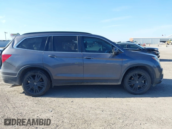 2021 Honda Pilot Special Edition with VIN 5FNYF5H27MB040801, listed as a IAAI auction lot 41656669 with 54,764 mi miles and . Bid and sale history available at DreamBid. Image 13.