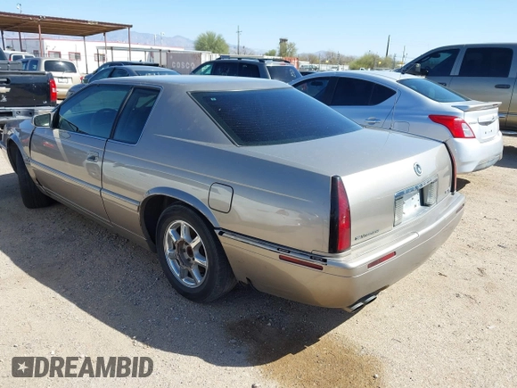 2001 Cadillac Eldorado Touring ETC z VIN 1G6ET12971B109319, wystawiony jako IAAI lot #41682779 z przebiegiem 147 515 mil mil oraz . Historia ofert i sprzedaży dostępna na DreamBid. Obrazek 3.