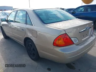 2001 Toyota Avalon XL z VIN 4T1BF28B31U185174, wystawiony jako IAAI lot #42338204 z przebiegiem 298 540 mil mil oraz . Historia ofert i sprzedaży dostępna na DreamBid. Obrazek 3.
