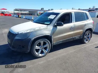 2010 Volkswagen Tiguan with VIN WVGAV9AX1AW513306, listed as a IAAI auction lot 41626072 with 162,086 mi miles and . Bid and sale history available at DreamBid. Image 2.