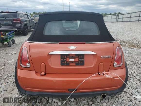 2006 MINI Convertible with VIN WMWRF335X6TG15824, listed as a Copart auction lot 56163205 with 113,109 mi miles and Salvage title. Bid and sale history available at DreamBid. Image 6.