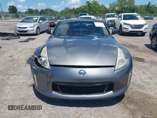 2013 Nissan 370Z Touring z VIN JN1AZ4EH2DM384011, wystawiony jako IAAI lot #42274166 z przebiegiem 87 499 mil mil oraz . Historia ofert i sprzedaży dostępna na DreamBid. Obrazek 12.