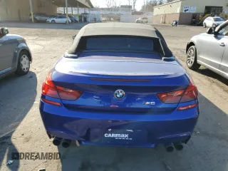 2015 BMW M6 z VIN WBSLZ9C55FD651441, wystawiony jako Copart lot #78511203 z przebiegiem 45 569 mil mil oraz Czysty tytuł • Clean title. Historia ofert i sprzedaży dostępna na DreamBid. Obrazek 6.