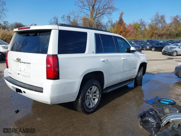 2016 Chevrolet Tahoe LS with VIN 1GNSKAKC2GR408884, listed as a IAAI auction lot 40885051 with 124,858 mi miles. Bid and sale history available at carsss.com. Image 4.
