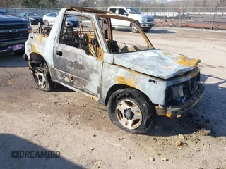 1996 Chevrolet Tracker z VIN 2CNBJ1869T6914128, wystawiony jako IAAI lot #41399004 z przebiegiem Nie podano mil oraz . Historia ofert i sprzedaży dostępna na DreamBid. Obrazek 1.