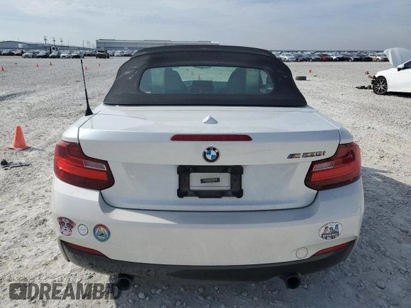 2016 BMW 2 Series M235i with VIN WBA1M1C52GV394052, listed as a Copart auction lot 82261594 with 83,979 mi miles and Salvage Title. Bid and sale history available at carsss.com. Image 6.