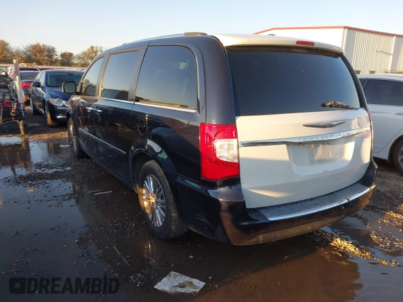 2011 Chrysler Town & Country Limited with VIN 2A4RR6DG4BR716460, listed as a IAAI auction lot 41073221 with 136,779 mi miles. Bid and sale history available at carsss.com. Image 3.