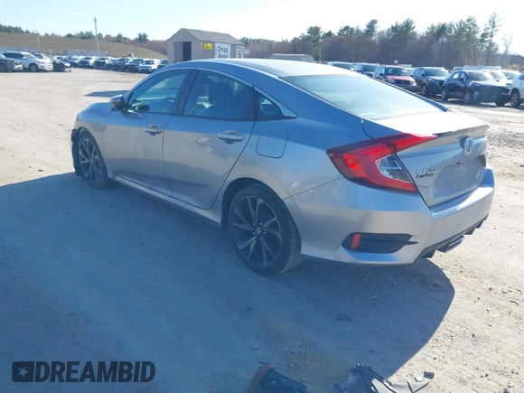 2019 Honda Civic Sport with VIN 2HGFC2F8XKH602463, listed as a IAAI auction lot 41966052 with 95,416 mi miles and . Bid and sale history available at DreamBid. Image 3.