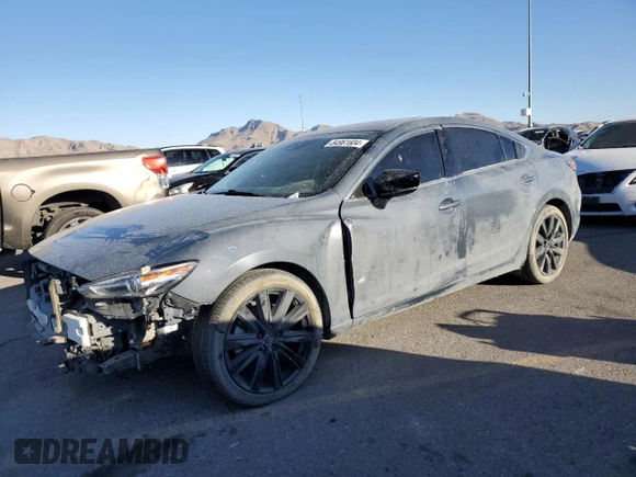 2021 Mazda 6 Carbon Edition with VIN JM1GL1WY0M1610974, listed as a Copart auction lot 84961604 with 55,107 mi miles and Salvage Title. Bid and sale history available at DreamBid. Image 1.