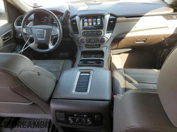 2020 GMC Yukon Denali with VIN 1GKS1CKJ6LR170901, listed as a Copart auction lot 76034594 with 118,738 mi miles and Salvage Title. Bid and sale history available at carsss.com. Image 8.