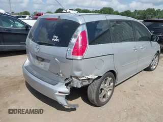 2009 Mazda 5 Sport z VIN JM1CR293090355422, wystawiony jako IAAI lot #42567279 z przebiegiem 214 402 mil mil oraz . Historia ofert i sprzedaży dostępna na DreamBid. Obrazek 4.