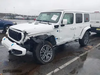 2024 Jeep Wrangler 4xe High Altitude with VIN 1C4RJXU6XRW209302, listed as a IAAI auction lot 41116289 with 2,862 mi miles. Bid and sale history available at carsss.com. Image 2.