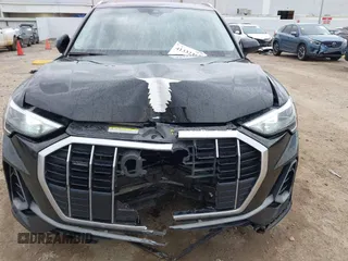 2020 Audi Q3 S line Premium z VIN WA1DECF34L1088002, wystawiony jako IAAI lot #41332352 z przebiegiem 41 196 mil mil oraz . Historia ofert i sprzedaży dostępna na DreamBid. Obrazek 6.