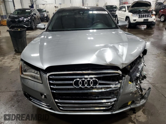2012 Audi A8 z VIN WAURVAFD3CN025035, wystawiony jako Copart lot #52252915 z przebiegiem 71 312 mil mil oraz Szkoda całkowita • Salvage title. Historia ofert i sprzedaży dostępna na DreamBid. Obrazek 5.
