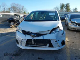 2018 Toyota Sienna L with VIN 5TDZZ3DC4JS956096, listed as a IAAI auction lot 41244790 with 94,072 mi miles and . Bid and sale history available at DreamBid. Image 12.