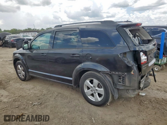 2012 Dodge Journey SXT with VIN 3C4PDCBG9CT208187, listed as a Copart auction lot 61969185 with 156,295 mi miles and Salvage title. Bid and sale history available at DreamBid. Image 2.