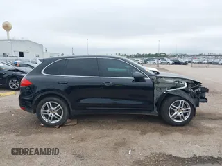 2014 Porsche Cayenne with VIN WP1AA2A21ELA92673, listed as a IAAI auction lot 41597732 with 140,673 mi miles and . Bid and sale history available at DreamBid. Image 14.