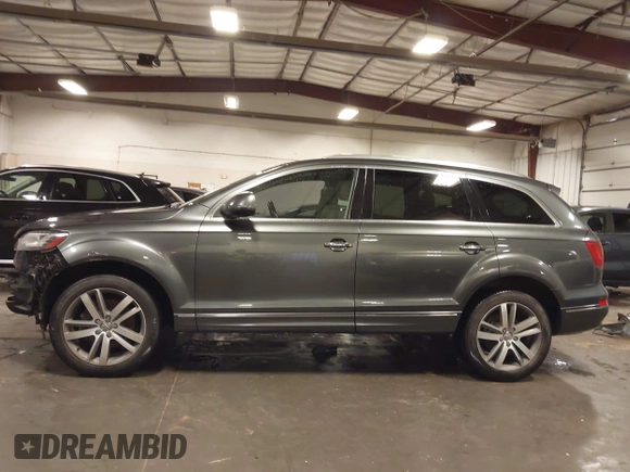 2015 Audi Q7 Premium Plus z VIN WA1LGAFE1FD023297, wystawiony jako IAAI lot #42128488 z przebiegiem 173 407 mil mil oraz . Historia ofert i sprzedaży dostępna na DreamBid. Obrazek 15.