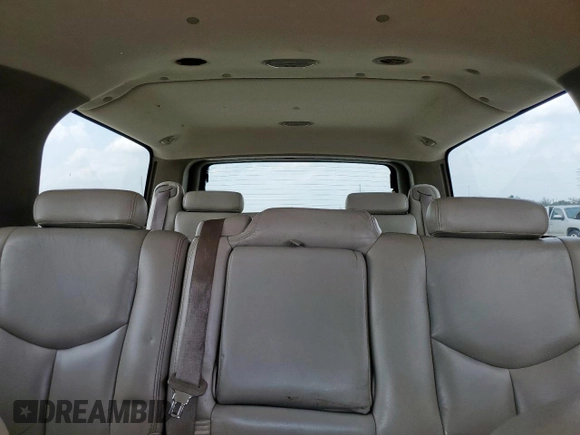2004 Chevrolet Suburban LT z VIN 1GNEC16Z44R302179, wystawiony jako Copart lot #57956605 z przebiegiem 291 567 mil mil oraz Szkoda całkowita • Salvage title. Historia ofert i sprzedaży dostępna na DreamBid. Obrazek 10.