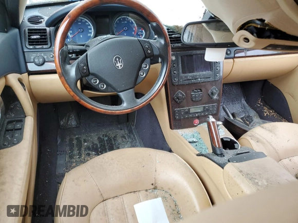 2006 Maserati Quattroporte z VIN ZAMCE39A460025290, wystawiony jako Copart lot #78816054 z przebiegiem Nie podano mil oraz Szkoda całkowita • Salvage title. Historia ofert i sprzedaży dostępna na DreamBid. Obrazek 8.