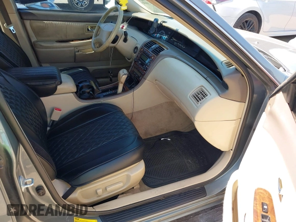 2001 Toyota Avalon XL z VIN 4T1BF28B21U145748, wystawiony jako IAAI lot #42251004 z przebiegiem 182 959 mil mil oraz . Historia ofert i sprzedaży dostępna na DreamBid. Obrazek 5.