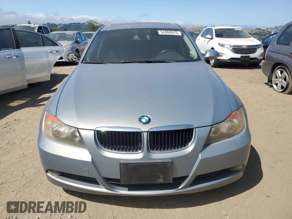 2007 BMW 3 Series 328i with VIN WBAVC53547FZ71265, listed as a Copart auction lot 54000075 with 130,559 mi miles and Salvage title. Bid and sale history available at DreamBid. Image 5.