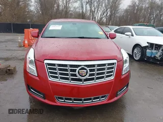 2013 Cadillac XTS z VIN 2G61N5S36D9129188, wystawiony jako IAAI lot #41824147 z przebiegiem 80 985 mil mil oraz . Historia ofert i sprzedaży dostępna na DreamBid. Obrazek 12.