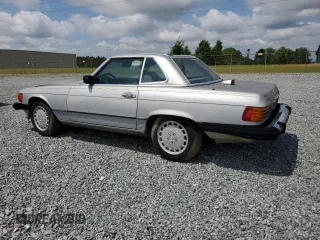 1986 Mercedes-Benz 560 with VIN WDBBA48D9GA037751, listed as a Copart auction lot 54861415 with 86,212 mi miles and Clean Title. Bid and sale history available at carsss.com. Image 2.