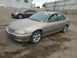 1999 Cadillac Catera z VIN W06VR52R1XR024920, wystawiony jako Copart lot #51347845 z przebiegiem 85 919 mil mil oraz Tytuł czysty. Historia ofert i sprzedaży dostępna na DreamBid. Obrazek 1.