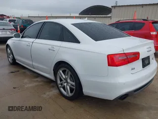 2014 Audi A6 Prestige with VIN WAUHGAFC6EN154497, listed as a IAAI auction lot 42189308 with 97,472 mi miles and . Bid and sale history available at DreamBid. Image 3.