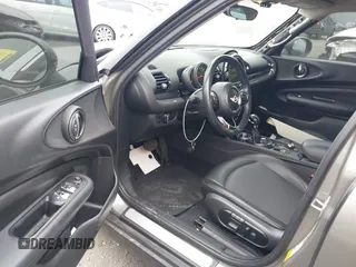 2016 MINI Clubman z VIN WMWLN5C56G2E30309, wystawiony jako IAAI lot #41772501 z przebiegiem 67 584 mil mil oraz . Historia ofert i sprzedaży dostępna na DreamBid. Obrazek 13.