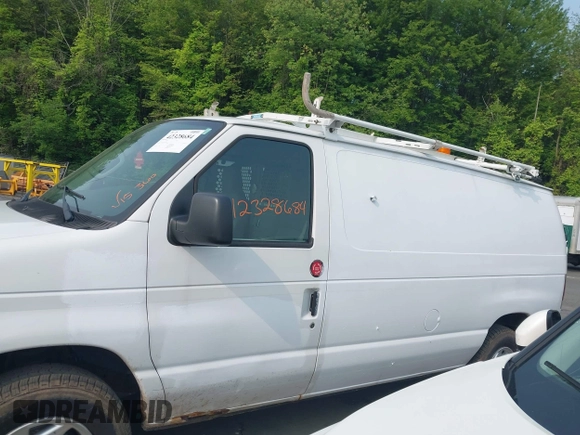 2011 Ford Econoline Cargo Commercial with VIN 1FTNE2ELXBDA18412, listed as a IAAI auction lot 42328684 with 115,484 mi miles and . Bid and sale history available at DreamBid. Image 15.