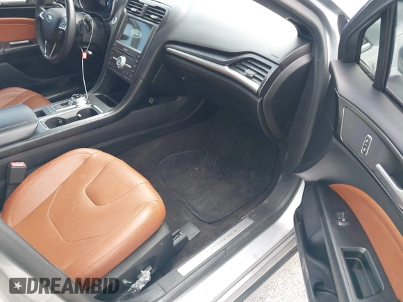 2020 Ford Fusion Titanium with VIN 3FA6P0D95LR199443, listed as a IAAI auction lot 42721371 with 77,592 mi miles and . Bid and sale history available at DreamBid. Image 5.