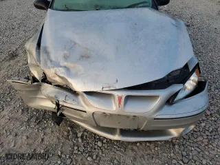 2004 Pontiac Grand Am GT1 with VIN 1G2NV52E14M667692, listed as a Copart auction lot 73339504 with 156,066 mi miles and Salvage Title. Bid and sale history available at carsss.com. Image 12.