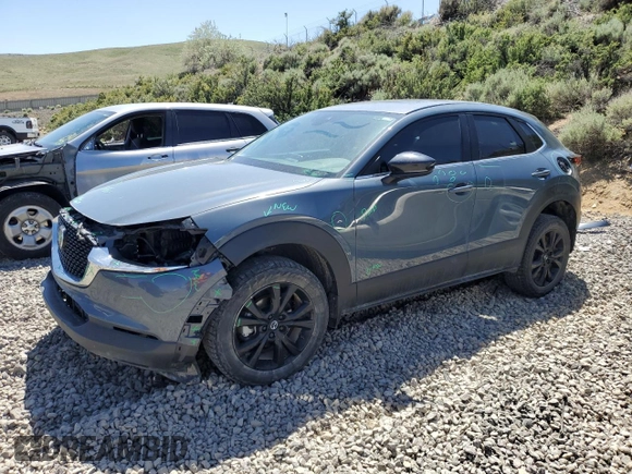 2023 Mazda CX-30 S Carbon Edition with VIN 3MVDMBCM1PM524019, listed as a Copart auction lot 57079355 with 46,737 mi miles and Salvage title. Bid and sale history available at DreamBid. Image 1.