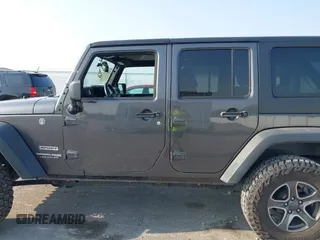 2018 Jeep Wrangler Unlimited Sport S with VIN 1C4BJWDG6JL854359, listed as a IAAI auction lot 42423170 with 84,470 mi miles and . Bid and sale history available at DreamBid. Image 15.