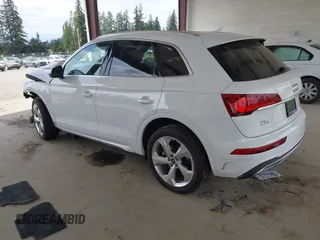 2021 Audi Q5 Premium Plus z VIN WA1BAAFY5M2004171, wystawiony jako IAAI lot #42140899 z przebiegiem 62 544 mil mil oraz . Historia ofert i sprzedaży dostępna na DreamBid. Obrazek 3.