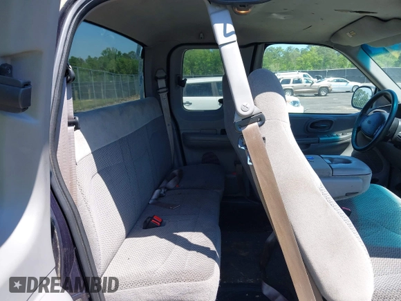 1999 Ford F-150 with VIN 1FTRX17W9XNB32397, listed as a IAAI auction lot 42048746 with 290,179 mi miles and . Bid and sale history available at DreamBid. Image 8.