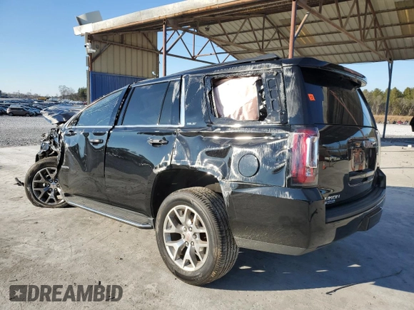 2019 GMC Yukon SLE with VIN 1GKS1AKC6KR302642, listed as a Copart auction lot 41510715 with 97,906 mi miles and Salvage Title. Bid and sale history available at carsss.com. Image 2.
