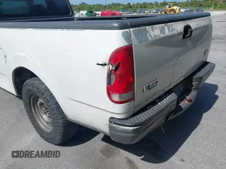 1999 Ford F-150 with VIN 1FTRX17W6XNB60822, listed as a IAAI auction lot 42310975 with Not provided miles and . Bid and sale history available at DreamBid. Image 6.