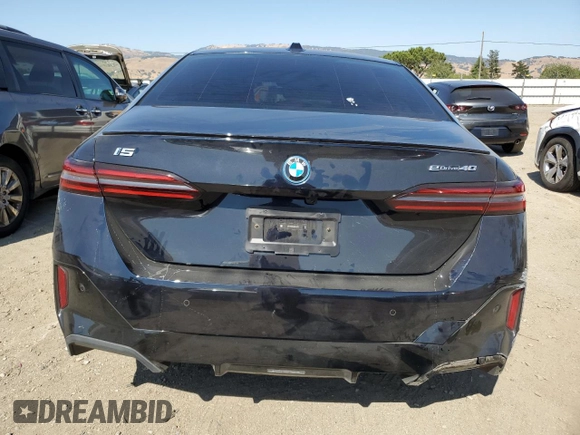 2024 BMW i5 eDrive40 with VIN WBY33FK03RCS14771, listed as a Copart auction lot 62393255 with 25,192 mi miles and Salvage title. Bid and sale history available at DreamBid. Image 6.